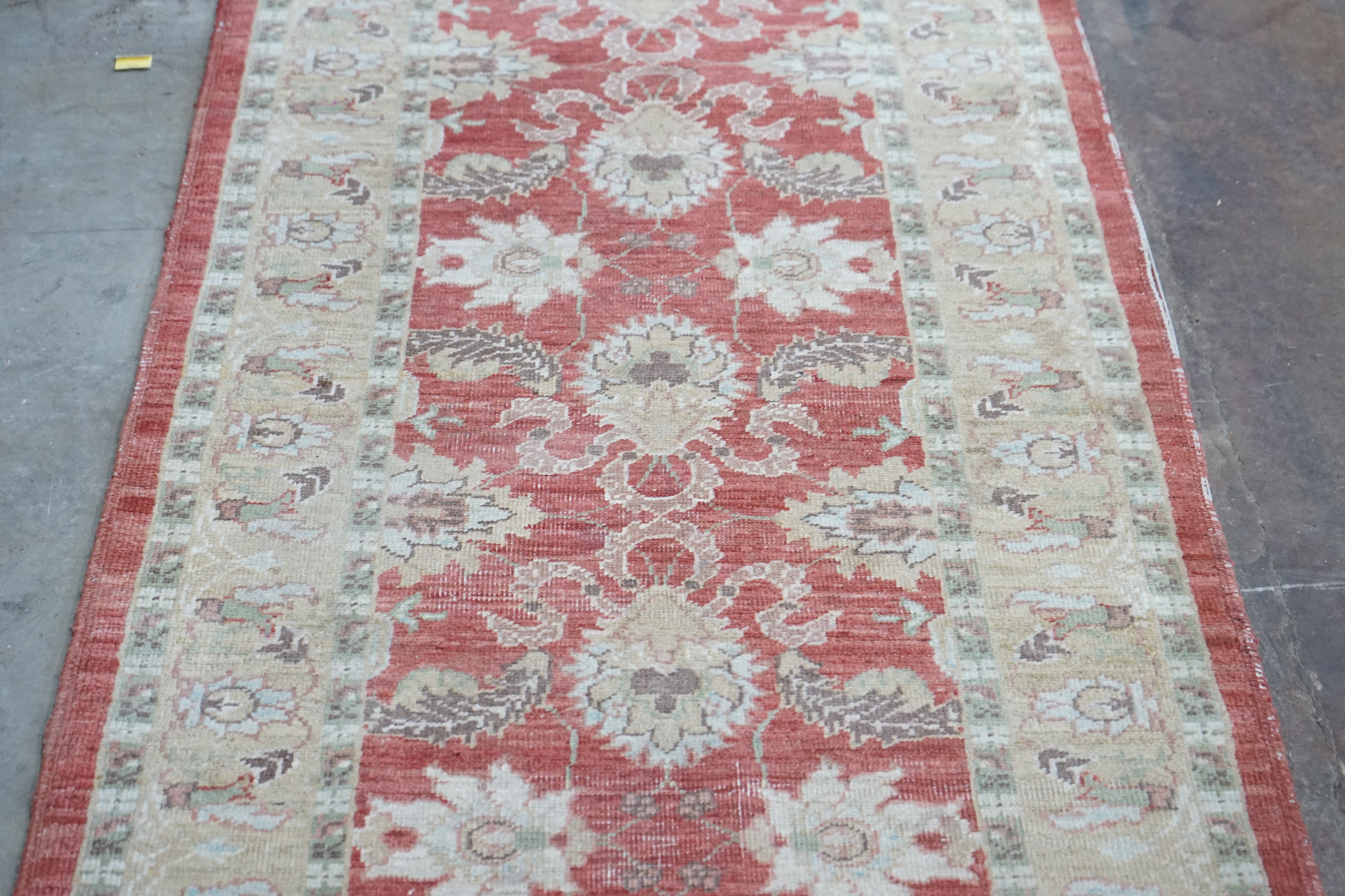A Ziegler style red ground runner, 364 x 84cm